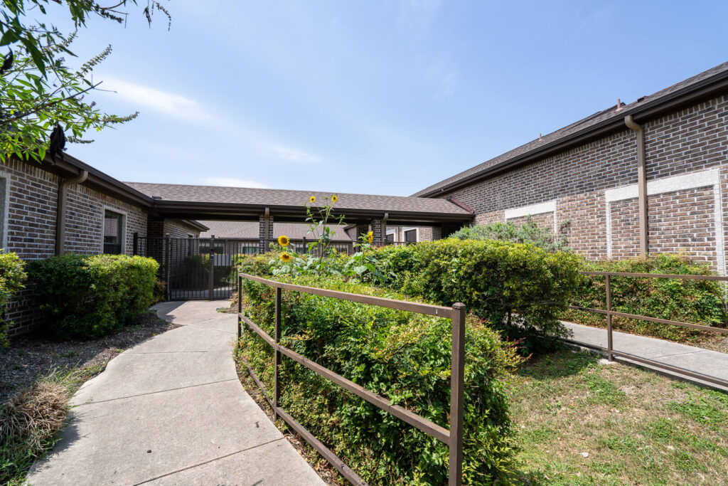 Peaceful Courtyard Walkway at Assisted Living San Antonio